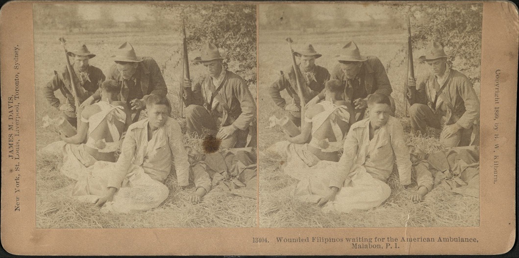 Wounded Filipinos waiting for the American Ambulance, Malabon, P. I.